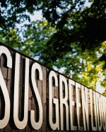 Close up photograph of the Jesus Green Lido signage on a summers day