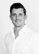 A black and white headshot of journey team member David Seddon