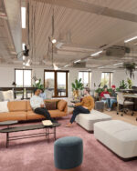 Computer Generated Image of an open plan office space break out area with sofas and large bright windows