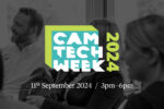 The Cambridge Tech Week 2024 logo above a black and white image of people sitting and smiling at a presentation. Date of event included, 11th September 2024 from 3pm until 6pm.