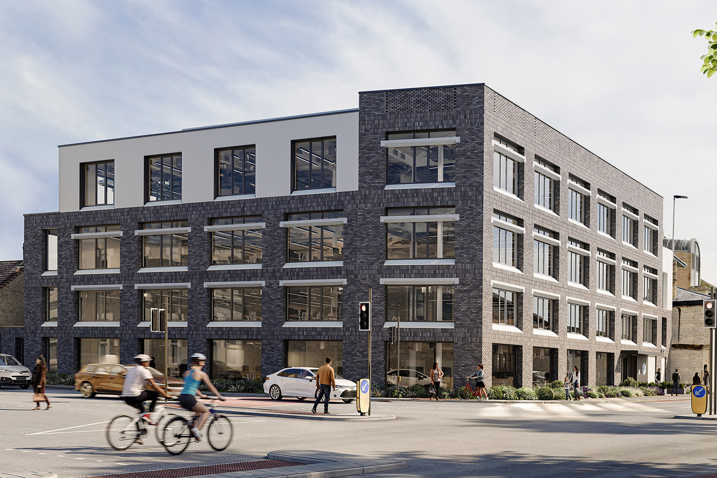 Computer generated image of the building exterior viewed from across the road, showing a brown brick building with large windows on a sunny day. Image for website carousel